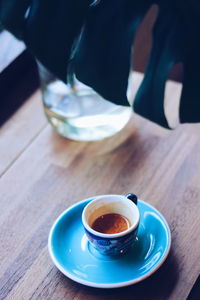 High angle view of coffee cup on table