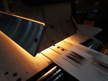 Close-up of glowing printing press