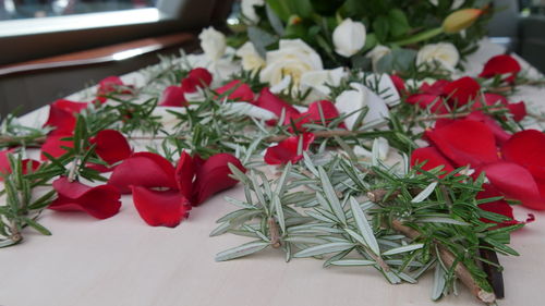 Closeup shot of a funeral casket or coffin in a hearse or chapel or burial at cemetery
