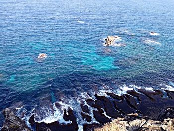 View of sea against blue sky