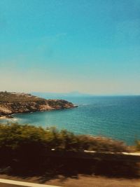 Scenic view of sea against clear blue sky