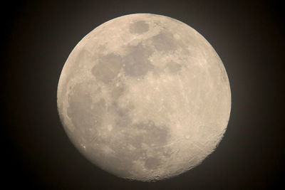 Low angle view of moon against sky at night