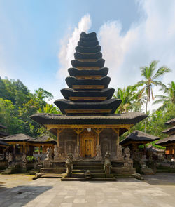 View of temple against building