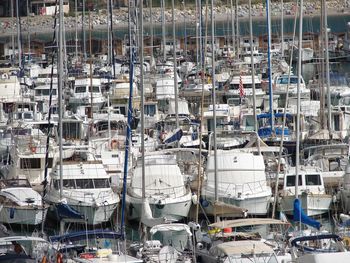 High angle view of boats moored at harbor