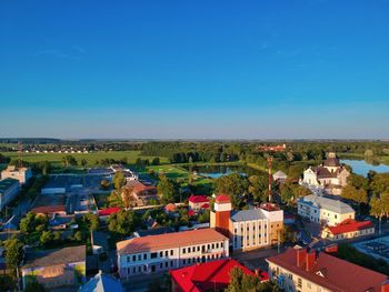 High angle view of townscape against clear blue sky