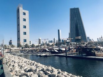 Modern buildings in city against sky