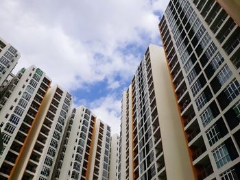 Low angle view of modern buildings against sky