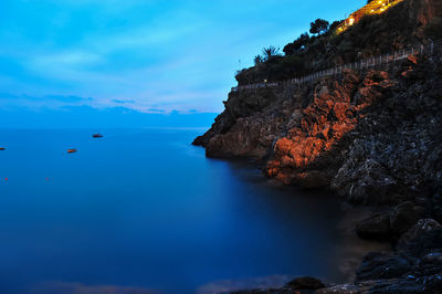 Scenic view of sea against cloudy sky