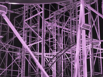 Low angle view of illuminated ferris wheel