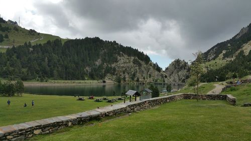 Scenic view of green landscape against sky