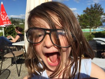 Close-up of boy wearing sunglasses