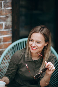 Young beautiful woman with long hair enjoying springtime.