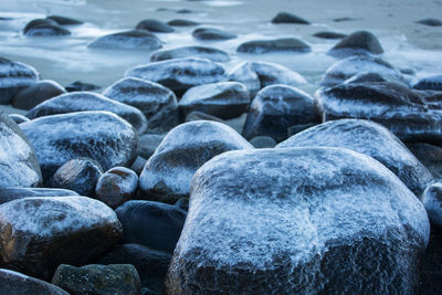 Close-up of stones on beach