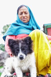 Portrait of woman with dog