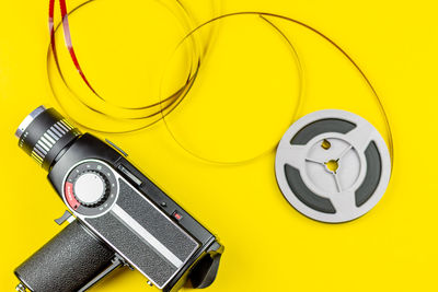 Close-up of yellow camera