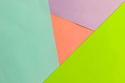 High angle view of multi colored paper on wall