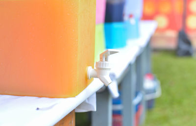 Close-up of multi colored railing against wall