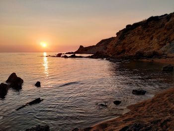 Scenic view of sea against sky during sunset