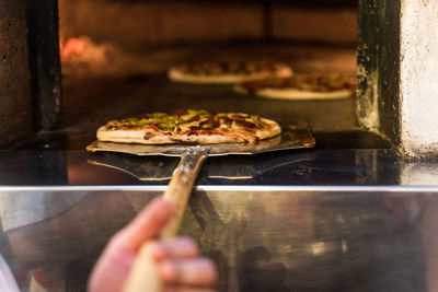 Close-up of person preparing food