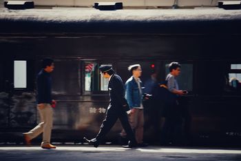 PEOPLE WALKING ON STEPS