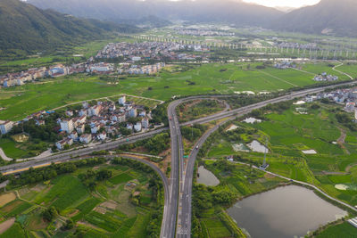 High angle view of road amidst buildings in city