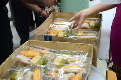 Close-up of hands for sale in market