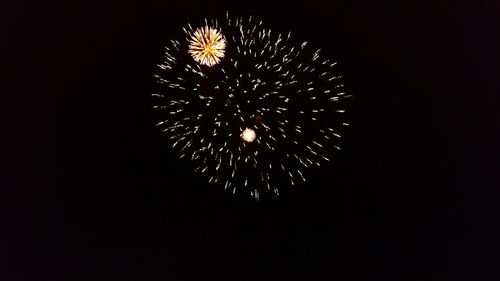 Low angle view of firework display