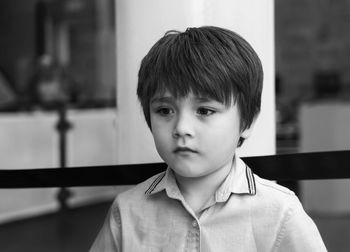 Portrait of cute boy looking away