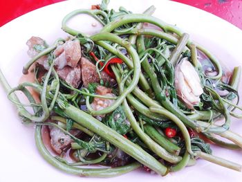 High angle view of vegetables in plate on table