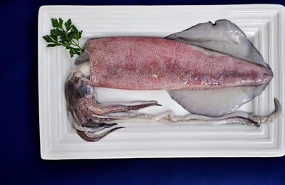 Close-up of fish in plate on table