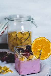 Close-up of drink in glass jar on table