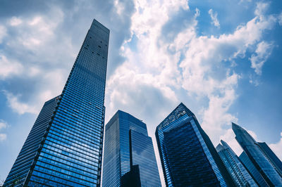 Low angle view of modern buildings against sky