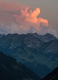Scenic view of mountains against sky during sunset