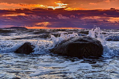 Panoramic view of sea against sky during sunset