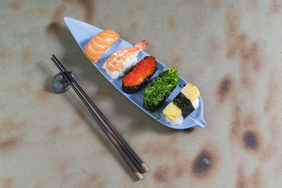High angle view of sushi in plate on table