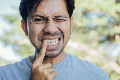 Close-up portrait of smiling man