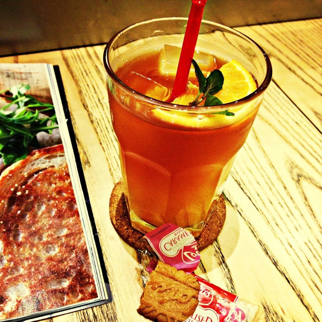 food and drink, indoors, table, freshness, drink, still life, refreshment, drinking glass, food, high angle view, healthy eating, close-up, ready-to-eat, serving size, indulgence, wood - material, glass - material, spoon, juice, bowl