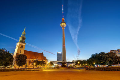 The famous alexanderplatz in berlin with the marienirche and the television tower at dawn