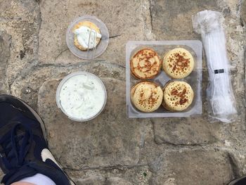 High angle view of breakfast on footpath