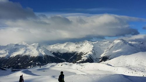 Scenic view of snow covered mountains