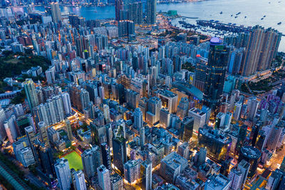 High angle view of illuminated modern buildings in city