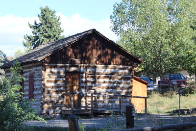 Exterior of house on field against sky