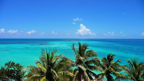 Scenic view of sea against blue sky