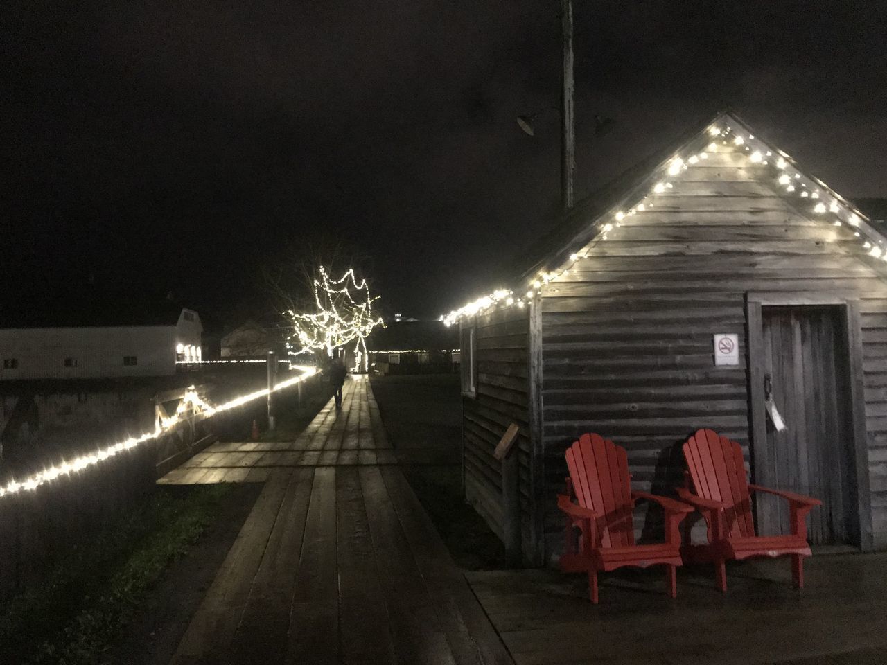 ILLUMINATED EMPTY CHAIRS AT NIGHT