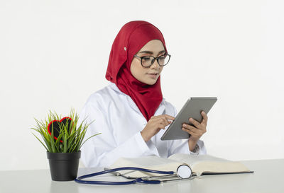 Young woman using mobile phone