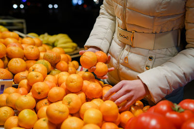 Full frame shot of orange fruits in market