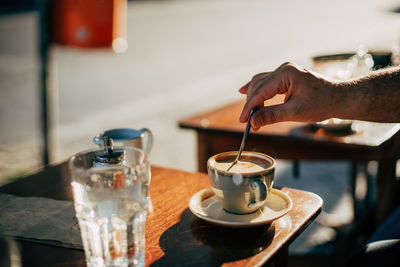 Close-up of coffee cup on table