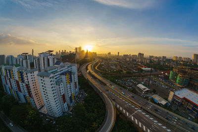 High angle view of cityscape against sky during sunset