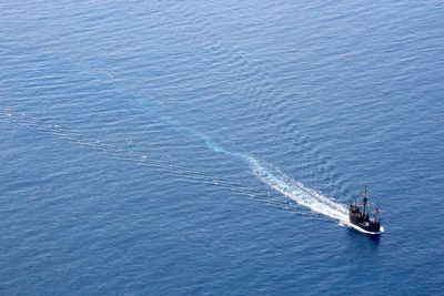 High angle view of sailboat sailing on sea