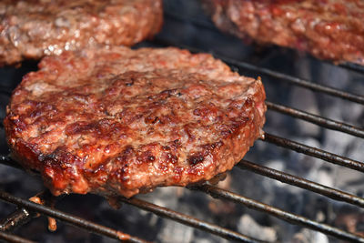 Close-up of meat on barbecue grill